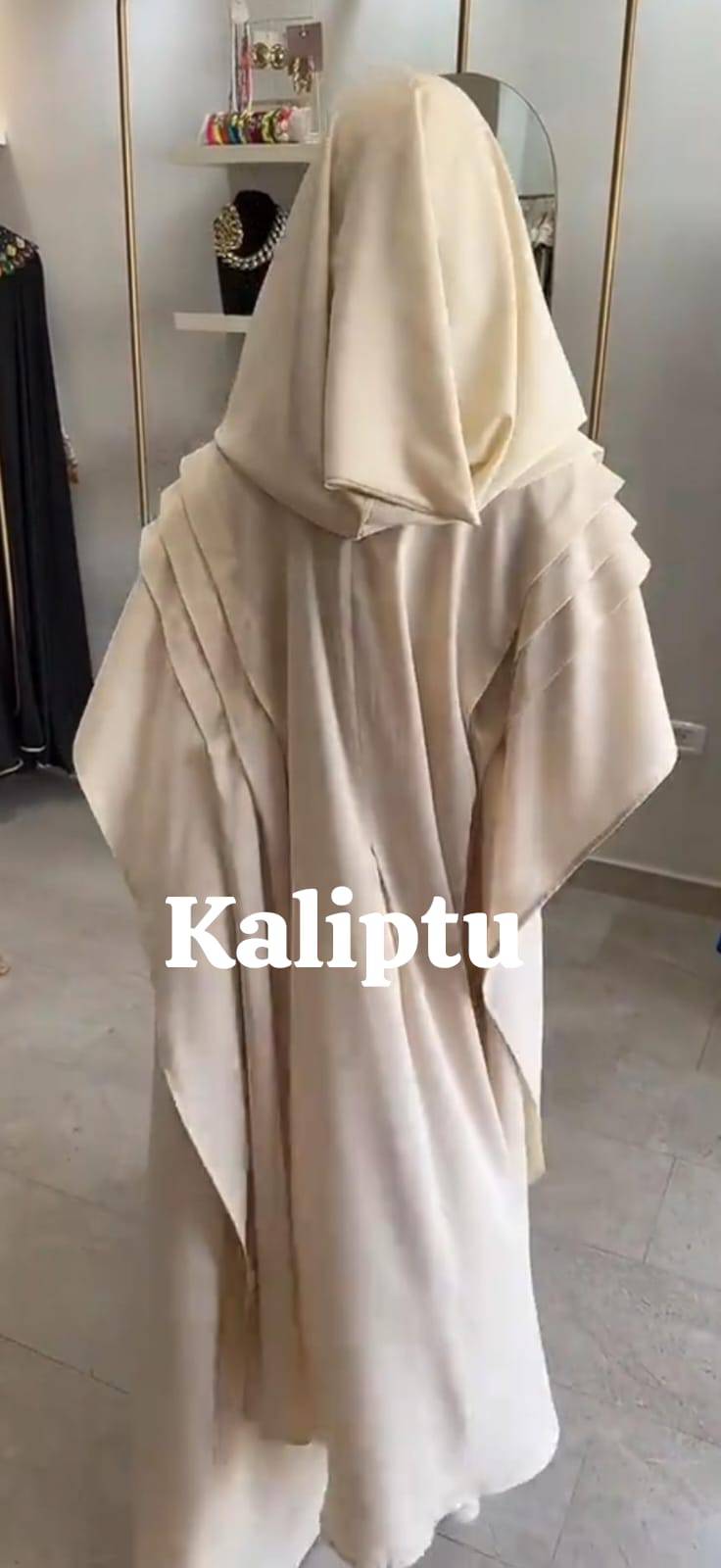 abaya with a hood or cap